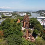 Aerial view of the ancient Po Nagar Cham Towers along the river in Nha Trang, Vietnam.