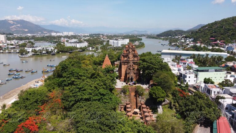 Aerial view of the ancient Po Nagar Cham Towers along the river in Nha Trang, Vietnam.